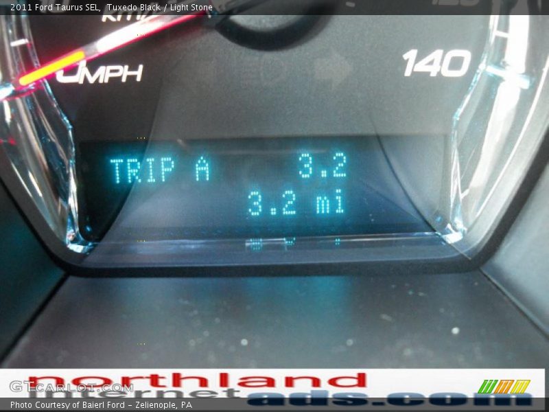 Tuxedo Black / Light Stone 2011 Ford Taurus SEL