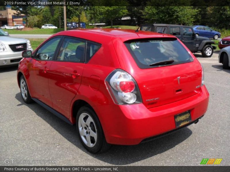 Red Hot Metallic / Ebony 2009 Pontiac Vibe