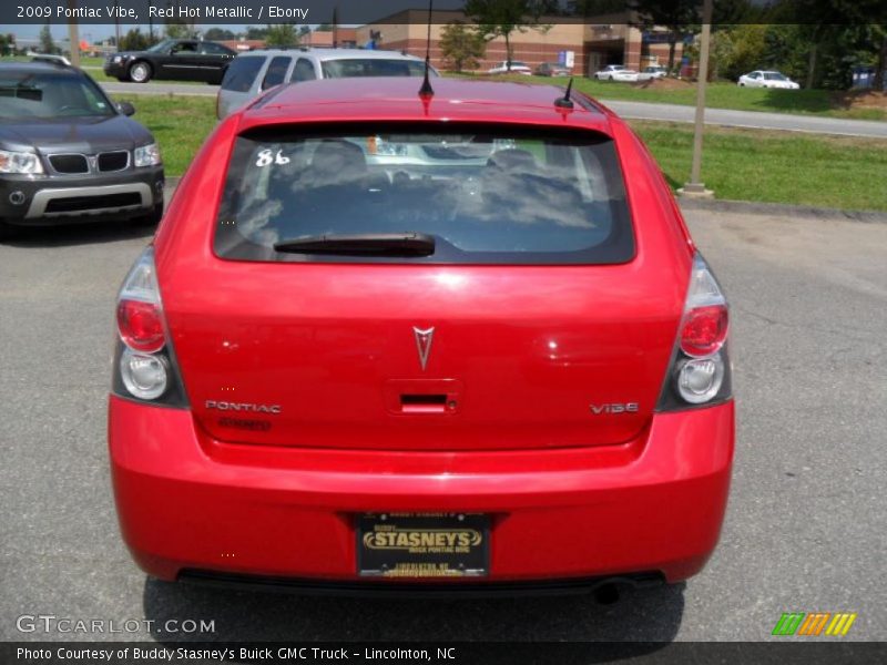Red Hot Metallic / Ebony 2009 Pontiac Vibe