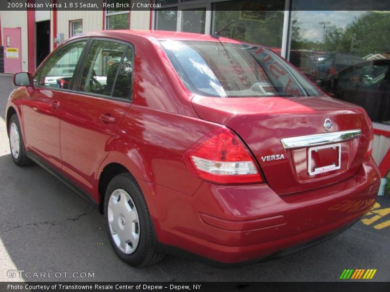 Red Brick / Charcoal 2009 Nissan Versa 1.8 S Sedan