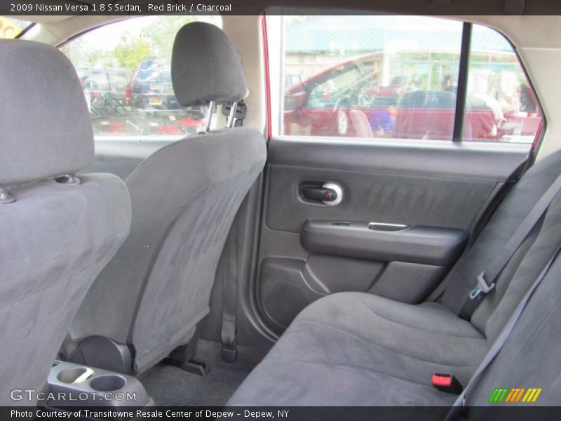 Red Brick / Charcoal 2009 Nissan Versa 1.8 S Sedan