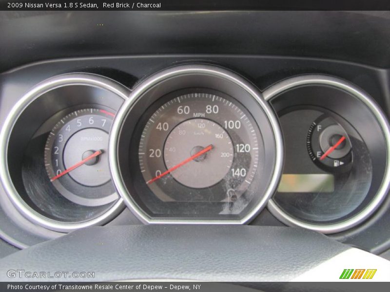 Red Brick / Charcoal 2009 Nissan Versa 1.8 S Sedan