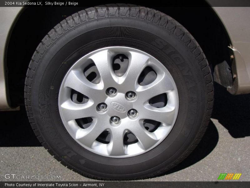Silky Beige / Beige 2004 Kia Sedona LX