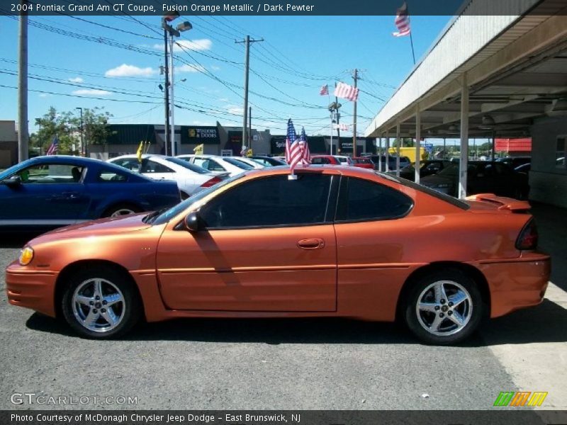 Fusion Orange Metallic / Dark Pewter 2004 Pontiac Grand Am GT Coupe