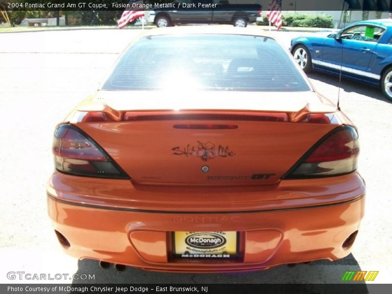Fusion Orange Metallic / Dark Pewter 2004 Pontiac Grand Am GT Coupe