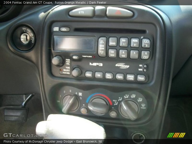 Fusion Orange Metallic / Dark Pewter 2004 Pontiac Grand Am GT Coupe