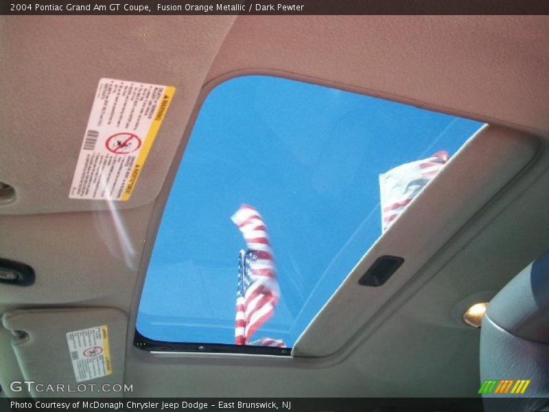 Fusion Orange Metallic / Dark Pewter 2004 Pontiac Grand Am GT Coupe