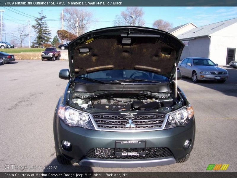 Manitoba Green Metallic / Black 2009 Mitsubishi Outlander SE 4WD