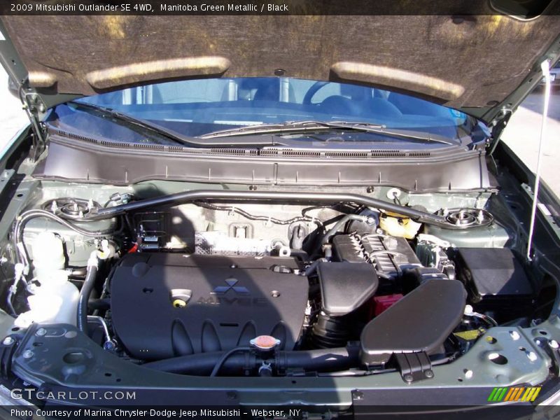 Manitoba Green Metallic / Black 2009 Mitsubishi Outlander SE 4WD