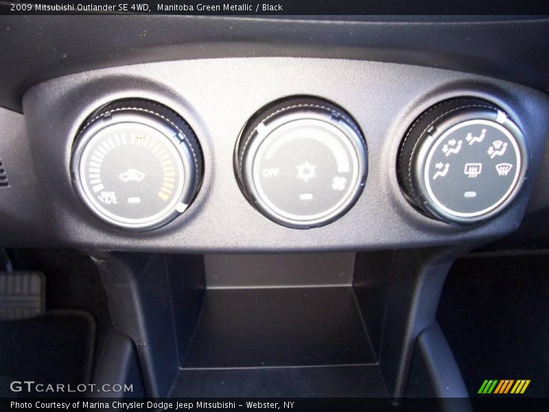 Manitoba Green Metallic / Black 2009 Mitsubishi Outlander SE 4WD