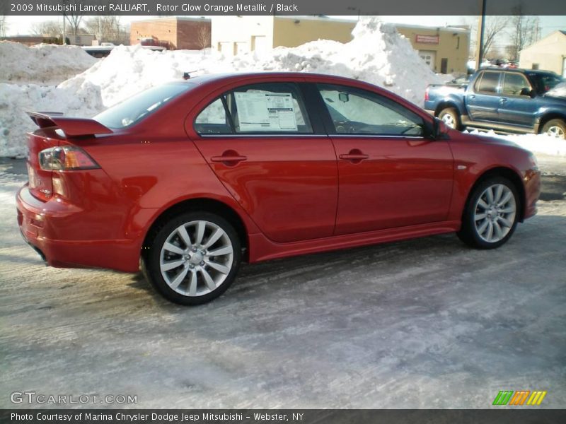 Rotor Glow Orange Metallic / Black 2009 Mitsubishi Lancer RALLIART