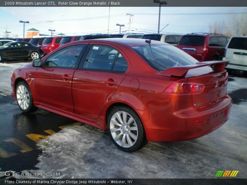 Rotor Glow Orange Metallic / Black 2009 Mitsubishi Lancer GTS