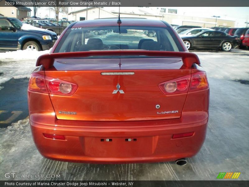 Rotor Glow Orange Metallic / Black 2009 Mitsubishi Lancer GTS