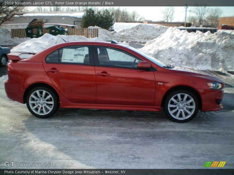 Rotor Glow Orange Metallic / Black 2009 Mitsubishi Lancer GTS
