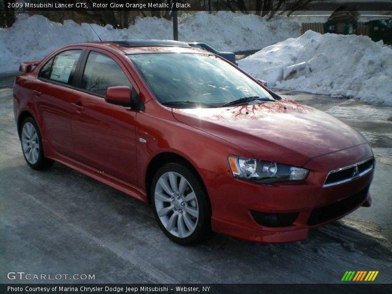 Rotor Glow Orange Metallic / Black 2009 Mitsubishi Lancer GTS