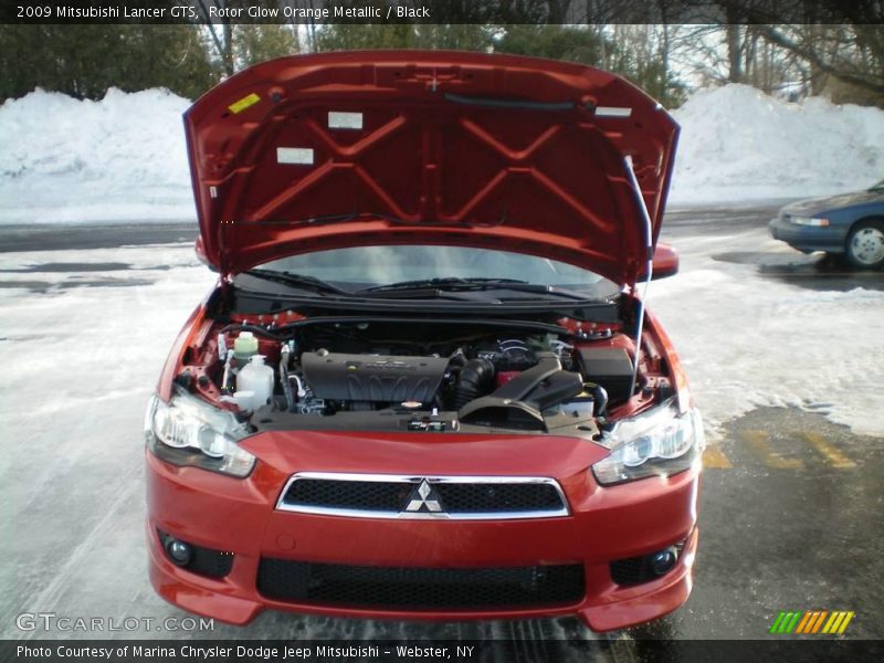Rotor Glow Orange Metallic / Black 2009 Mitsubishi Lancer GTS