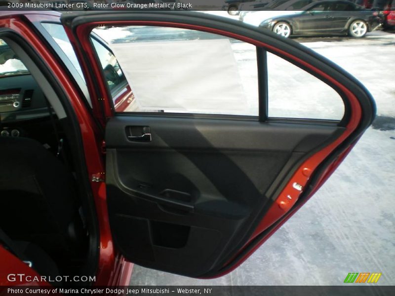 Rotor Glow Orange Metallic / Black 2009 Mitsubishi Lancer GTS