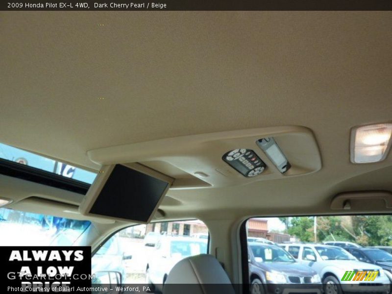 Dark Cherry Pearl / Beige 2009 Honda Pilot EX-L 4WD