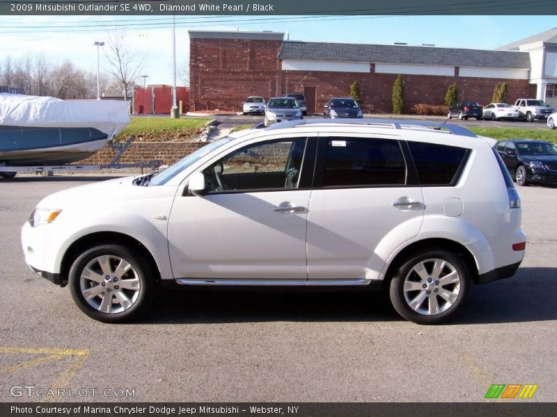 Diamond White Pearl / Black 2009 Mitsubishi Outlander SE 4WD