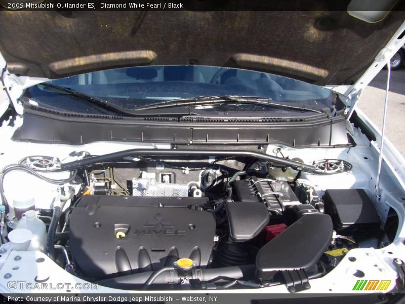 Diamond White Pearl / Black 2009 Mitsubishi Outlander ES