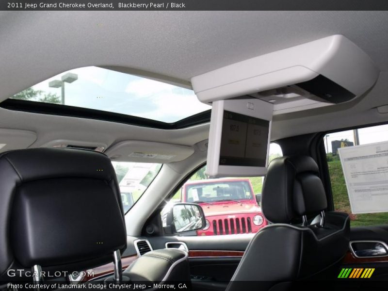 Blackberry Pearl / Black 2011 Jeep Grand Cherokee Overland