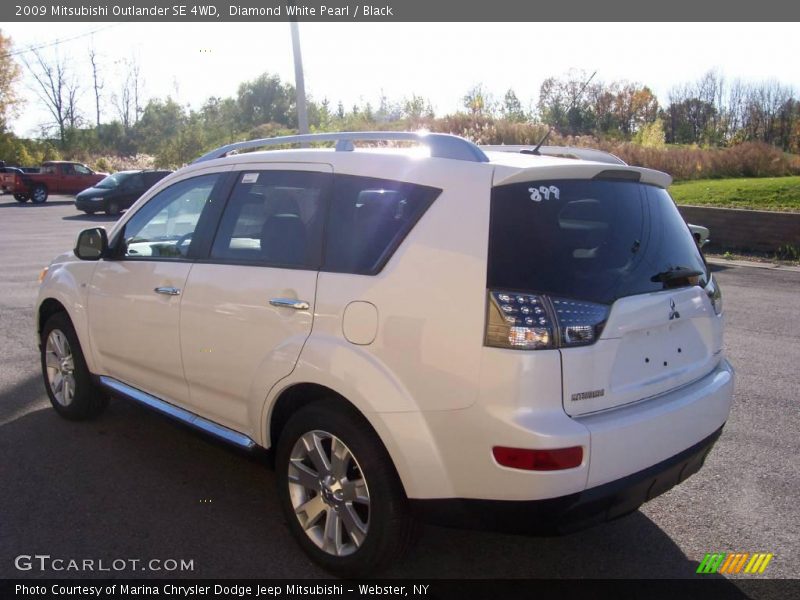 Diamond White Pearl / Black 2009 Mitsubishi Outlander SE 4WD