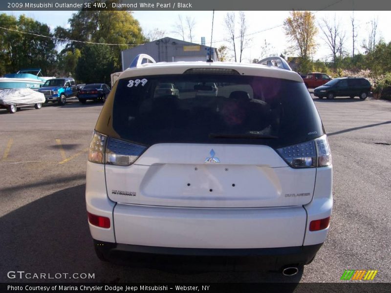 Diamond White Pearl / Black 2009 Mitsubishi Outlander SE 4WD