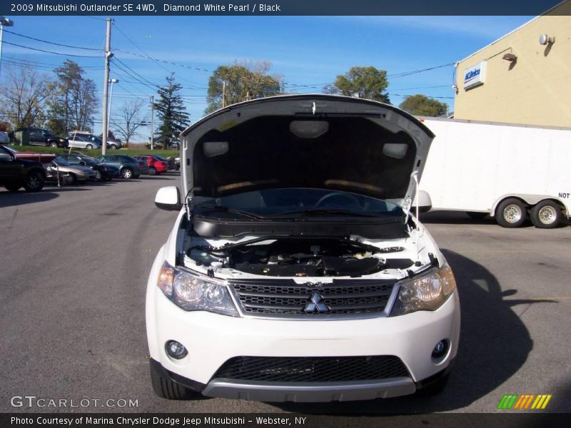 Diamond White Pearl / Black 2009 Mitsubishi Outlander SE 4WD