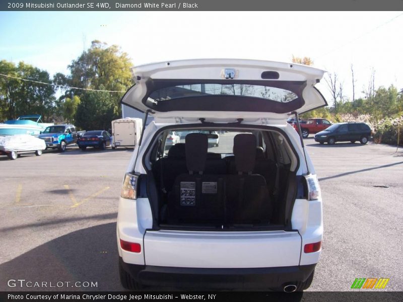 Diamond White Pearl / Black 2009 Mitsubishi Outlander SE 4WD