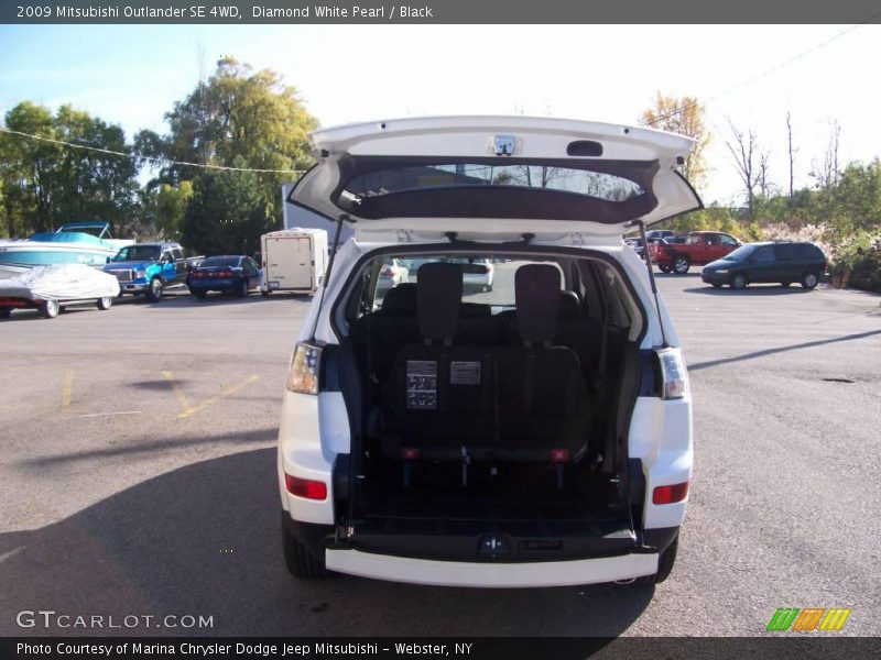 Diamond White Pearl / Black 2009 Mitsubishi Outlander SE 4WD