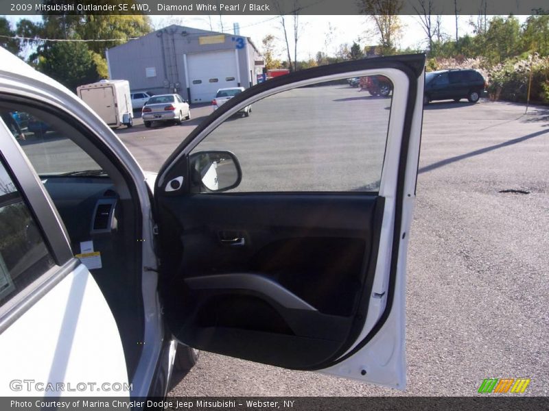 Diamond White Pearl / Black 2009 Mitsubishi Outlander SE 4WD