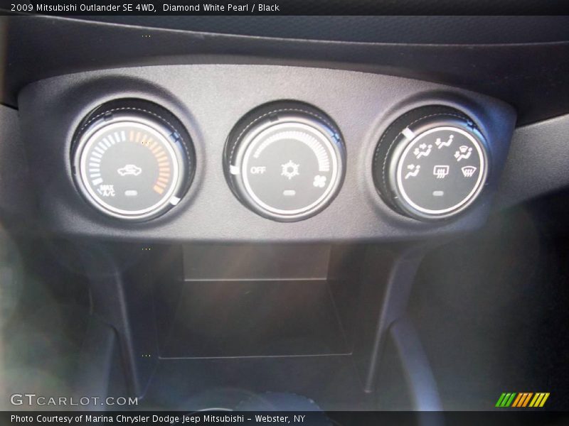 Diamond White Pearl / Black 2009 Mitsubishi Outlander SE 4WD