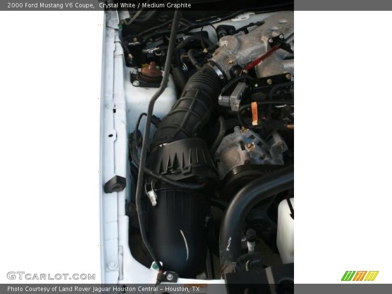 Crystal White / Medium Graphite 2000 Ford Mustang V6 Coupe