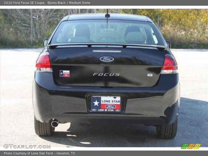 Ebony Black / Medium Stone 2010 Ford Focus SE Coupe