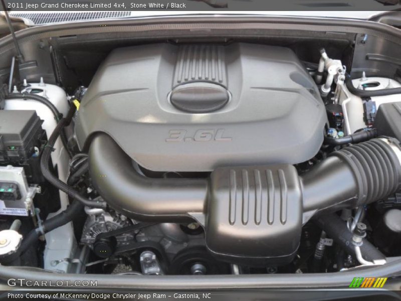 Stone White / Black 2011 Jeep Grand Cherokee Limited 4x4