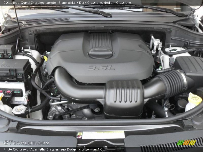 Stone White / Dark Graystone/Medium Graystone 2011 Jeep Grand Cherokee Laredo