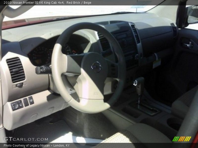Red Brick / Beige 2010 Nissan Frontier SE V6 King Cab 4x4