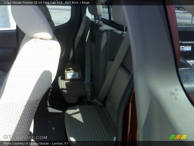 Red Brick / Beige 2010 Nissan Frontier SE V6 King Cab 4x4