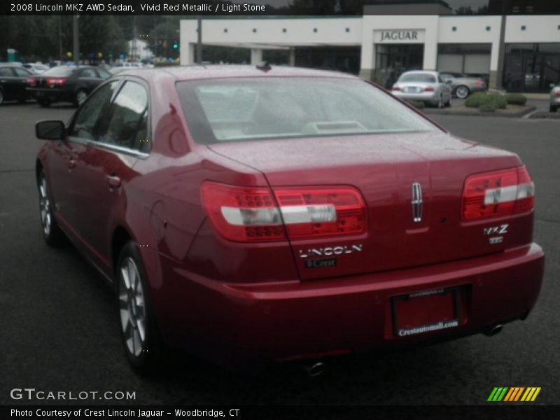 Vivid Red Metallic / Light Stone 2008 Lincoln MKZ AWD Sedan