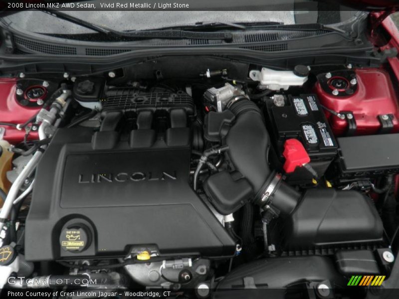 Vivid Red Metallic / Light Stone 2008 Lincoln MKZ AWD Sedan