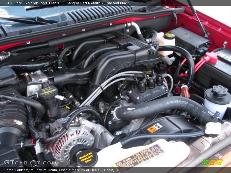 Sangria Red Metallic / Charcoal Black 2010 Ford Explorer Sport Trac XLT