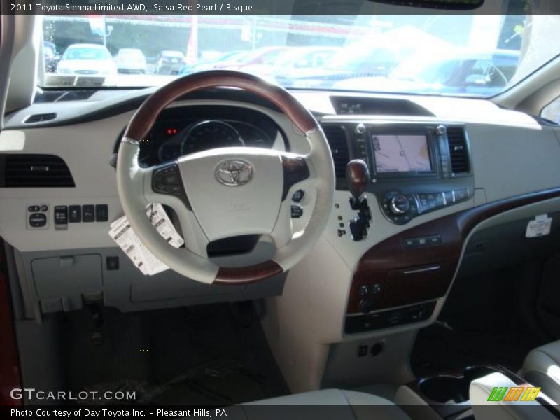 Salsa Red Pearl / Bisque 2011 Toyota Sienna Limited AWD