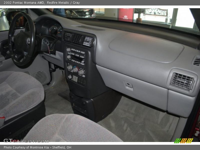 Redfire Metallic / Gray 2002 Pontiac Montana AWD