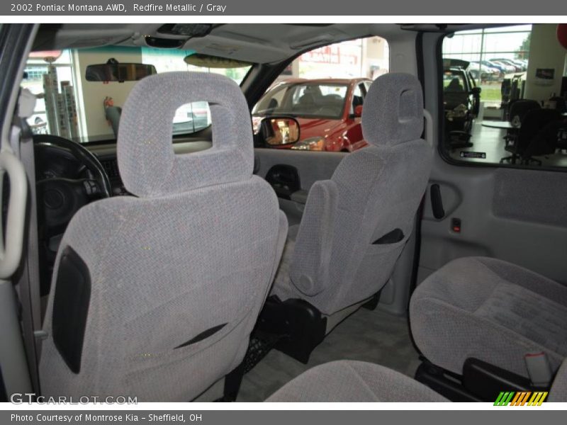 Redfire Metallic / Gray 2002 Pontiac Montana AWD