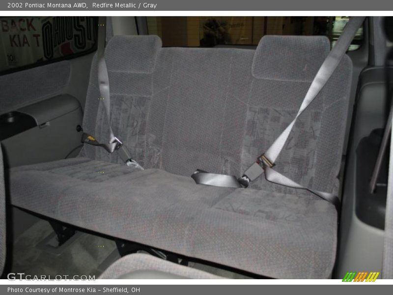 Redfire Metallic / Gray 2002 Pontiac Montana AWD