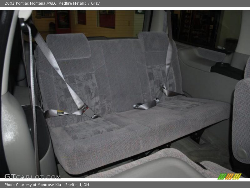 Redfire Metallic / Gray 2002 Pontiac Montana AWD