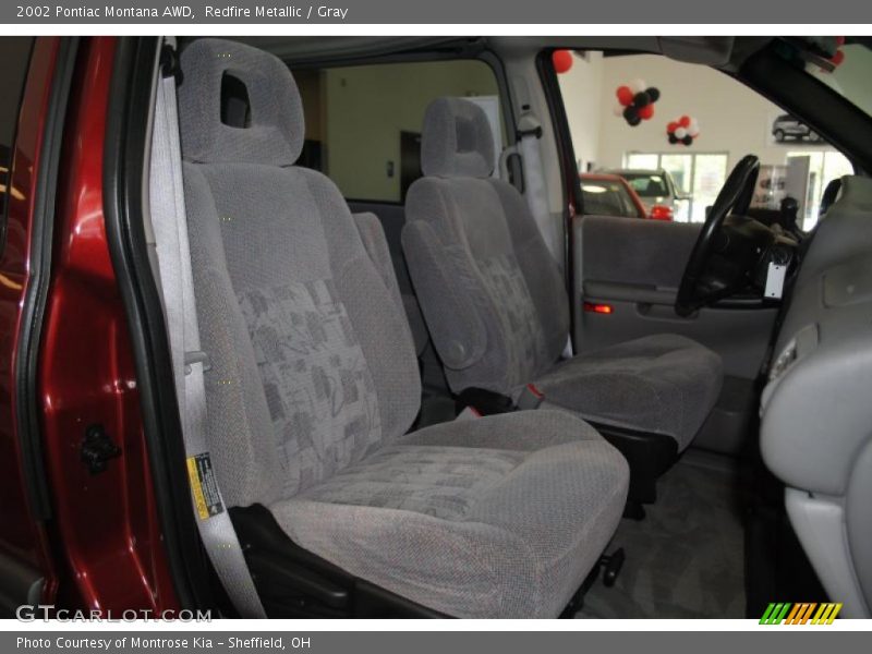 Redfire Metallic / Gray 2002 Pontiac Montana AWD