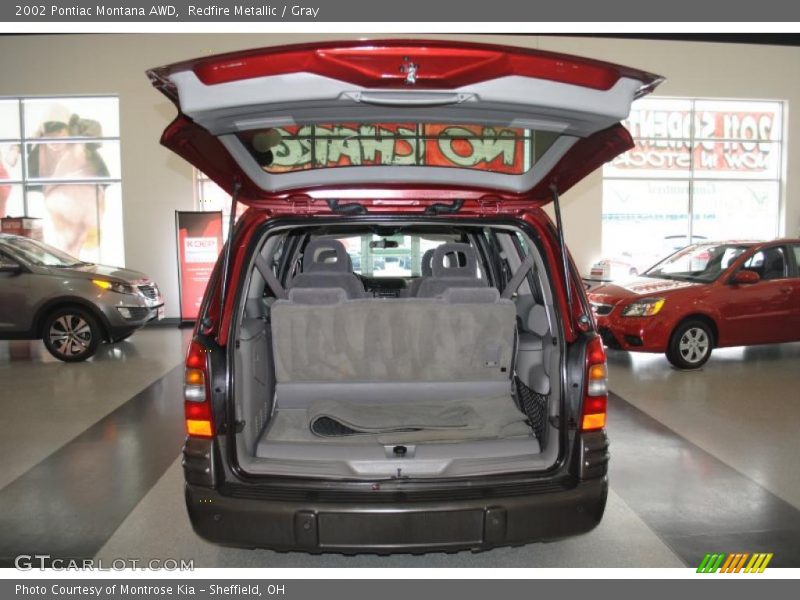Redfire Metallic / Gray 2002 Pontiac Montana AWD