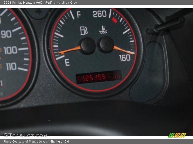 Redfire Metallic / Gray 2002 Pontiac Montana AWD