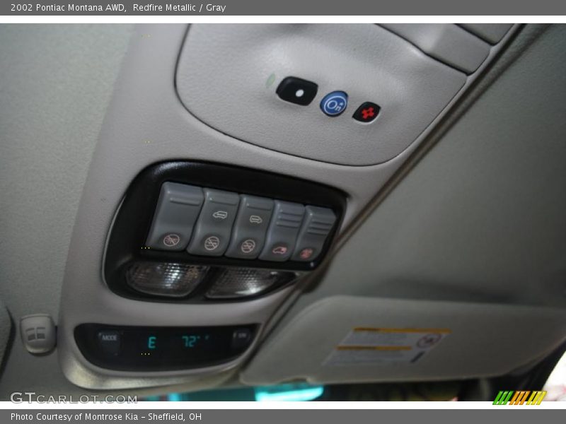 Redfire Metallic / Gray 2002 Pontiac Montana AWD